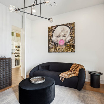The Obsidian: Primary Bedroom Sitting Area with Hidden Door