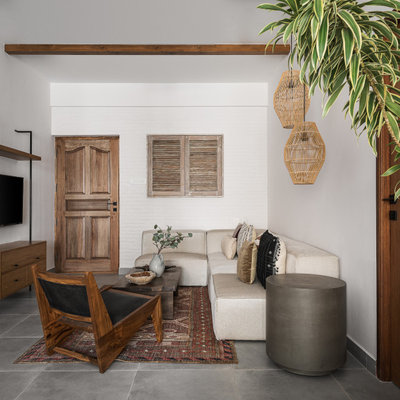 Eclectic Living Room by Sunita Yogesh Studio