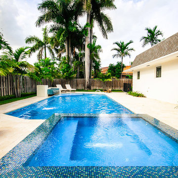 Classic/Straight Edge Pool With Custom Spa, Fountain and Sun Shelf in Miami, Fl