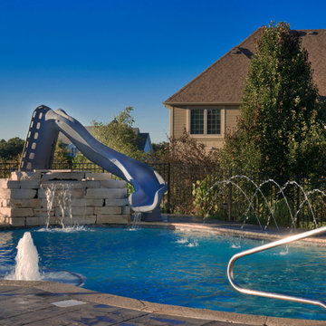 Yorkville, IL Freeform Swimming Pool With Water Slide and Water Features