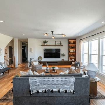 Living Room TV Wall with Custom Floating Shelves & Under-Cabinet Lighting