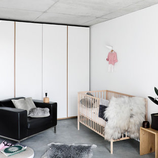 chambre de bébé moderne avec un sol gris  photos