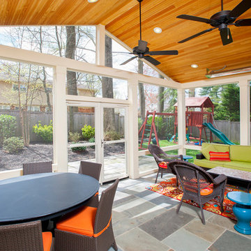 Screened porch with flagstone patio in Bethesda
