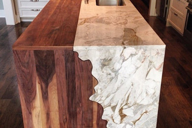 Example of a trendy eat-in kitchen design in Nashville with an island