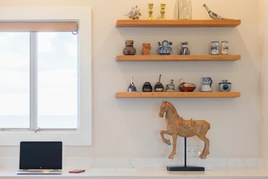Example of an eclectic home office design in Jacksonville