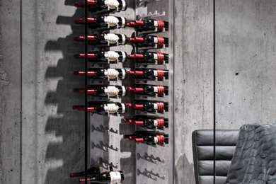 Wine cellar - industrial wine cellar idea in Vancouver