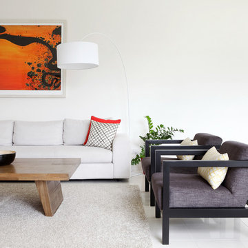 Bespoke armchairs teamed with Quercus and co bespoke cushions and arched floor l