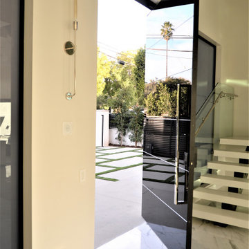 Custom Frameless Black Laminated Glass Oversized Pivot Door
