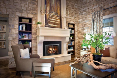 Inspiration for a large transitional open concept living room in Other with beige walls, medium hardwood floors, a tile fireplace surround, no tv, brown floor and a standard fireplace.