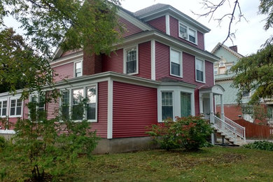 Minimalist red vinyl exterior home photo in New York