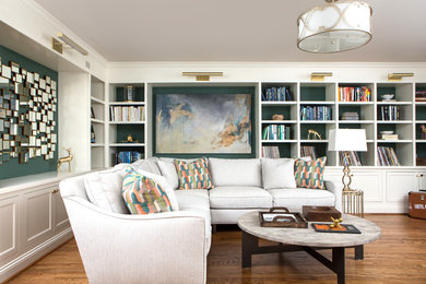 Basement - mid-sized contemporary underground medium tone wood floor basement idea in Nashville with white walls