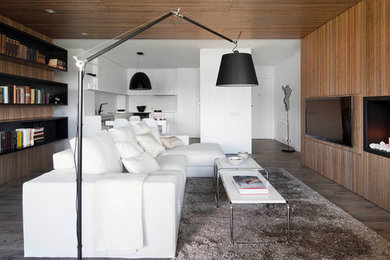 This is an example of a mid-sized contemporary open concept living room in Barcelona.