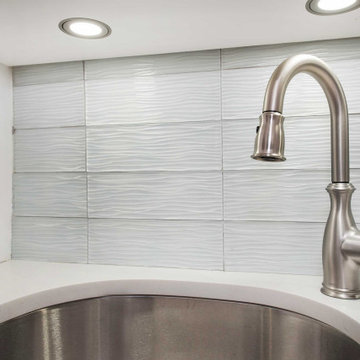 Grey Kitchen with Crystile Wave Backsplash