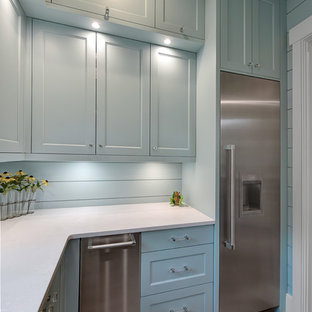 Beach style kitchen pantry inspiration - Coastal kitchen pantry photo in Charleston with stainless steel appliances
