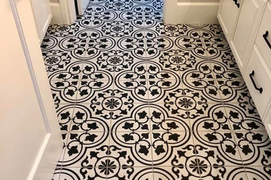 Doorless shower - mid-sized contemporary 3/4 white tile and ceramic tile ceramic tile and multicolored floor doorless shower idea in San Francisco with raised-panel cabinets, white cabinets, a one-piece toilet, gray walls, an undermount sink, marble countertops and white countertops