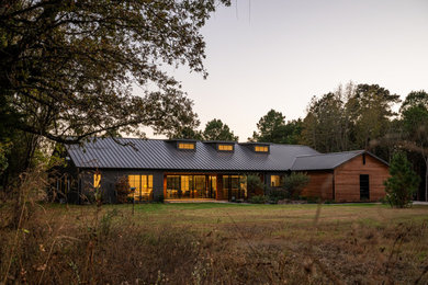 Inspiration for a country exterior home remodel in Dallas