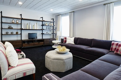 Inspiration for a large transitional open concept carpeted living room remodel in Cedar Rapids with gray walls and no fireplace