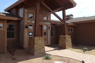 Inspiration for a rustic entryway remodel in Phoenix