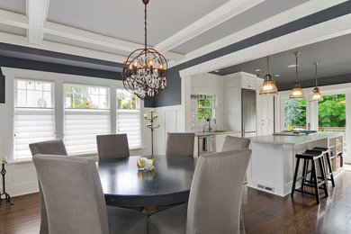 Kitchen/dining room combo - transitional medium tone wood floor, brown floor and exposed beam kitchen/dining room combo idea in Seattle
