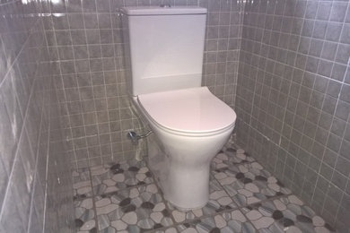 Bathroom - modern 3/4 bathroom idea with a freestanding vanity