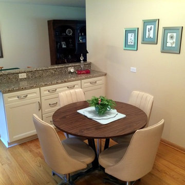 Small White "L" Shaped Kitchen in Naperville by Adam Hartig AKBD