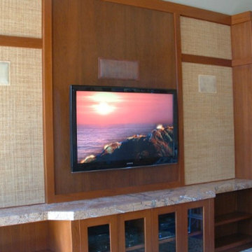 Faux painting speakers to match the walls is our specialty.