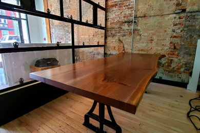 Example of a mid-century modern dining room design in Cincinnati