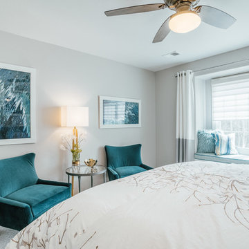 A sitting area and cozy window seat offer plenty of seating