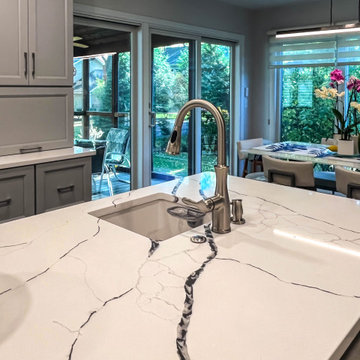 Custom Two Tone Gray Kosher Kitchen with Quartz Countertops
