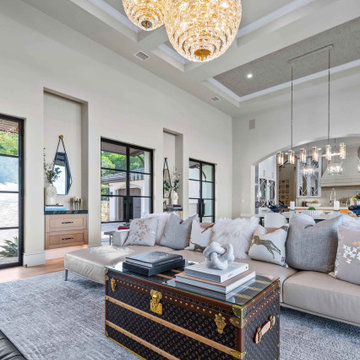 Living Room with Double Glass Doors to Motor Court