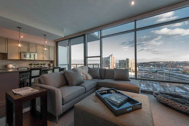 Inspiration for a transitional loft-style medium tone wood floor and brown floor living room remodel in Nashville