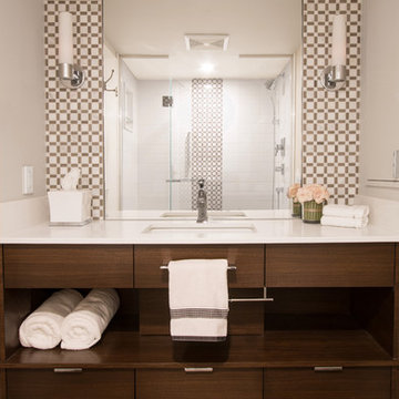Walnut vanity and white quartz bathroom