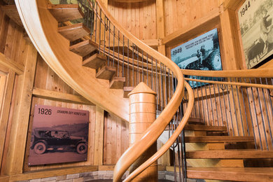 Inspiration for an expansive country wood floating staircase in Columbus with open risers.