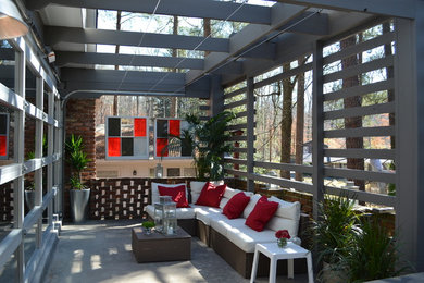 Example of an urban patio design in Atlanta