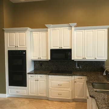 Resurface kitchen with new crown molding/light valences