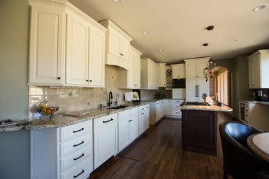 This is an example of a mid-sized modern kitchen in Denver.