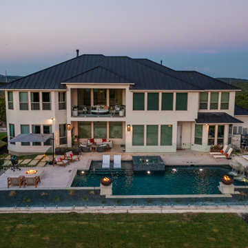 Transitional Contemporary Pool with Negative Edge Spa