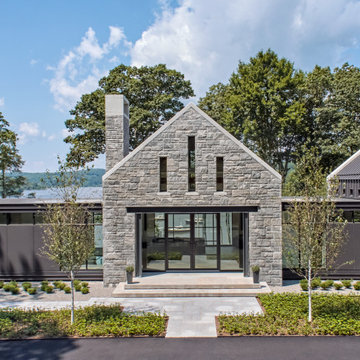 Waterfront Gothic Medieval Modern Stone Home Metal Roof