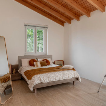 Casa O+C — Ristrutturazione e ampliamento di una villa immersa nel verde