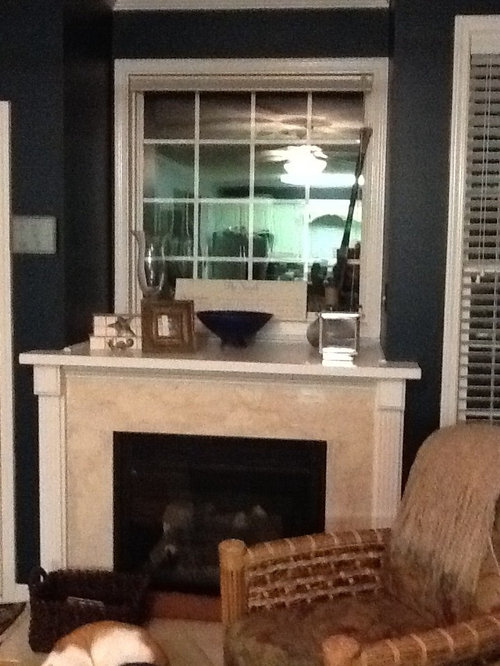 How to decorate this super deep fireplace niche