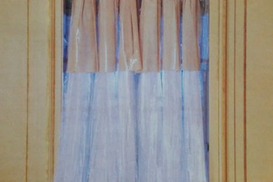 unconventional curtains made with dry cleaning bags,paper and aluminum