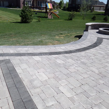 Raised Patio made with Unilock's Pisa Wall, Brussels and lL Campo Pavers
