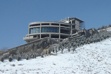 Example of a minimalist exterior home design in Other