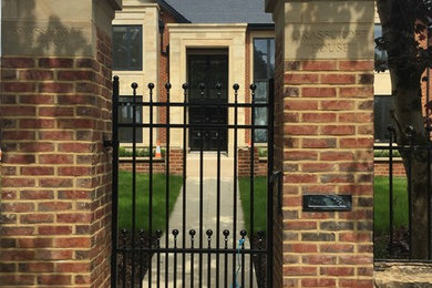 Expansive classic front door in Other with a double front door and a black front door.
