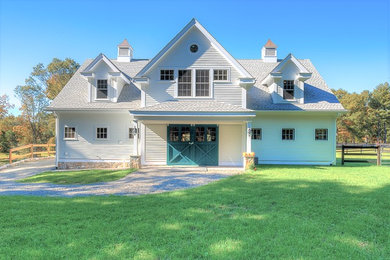Example of a large classic detached barn design in Boston