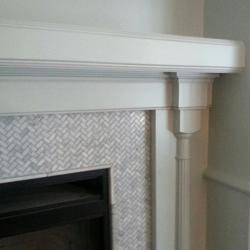 Detail of Carrara marble mosaic tile surround