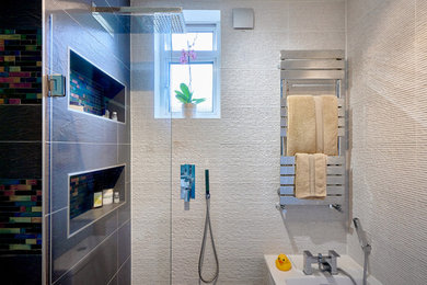 Design ideas for a small contemporary grey and teal bathroom in London with an alcove bath, multi-coloured tiles, mosaic tiles, blue walls, terracotta flooring, a wall-mounted sink, multi-coloured floors, an open shower and a wall niche.