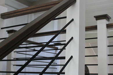 Inspiration for a mid-sized modern staircase remodel in Houston