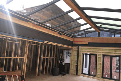 Example of a trendy home design design in Montreal