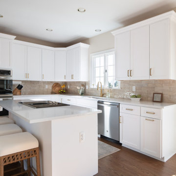 Bright White Shaker Kitchen Cabinets with White-Gray Quartz Countertops in Mt. A